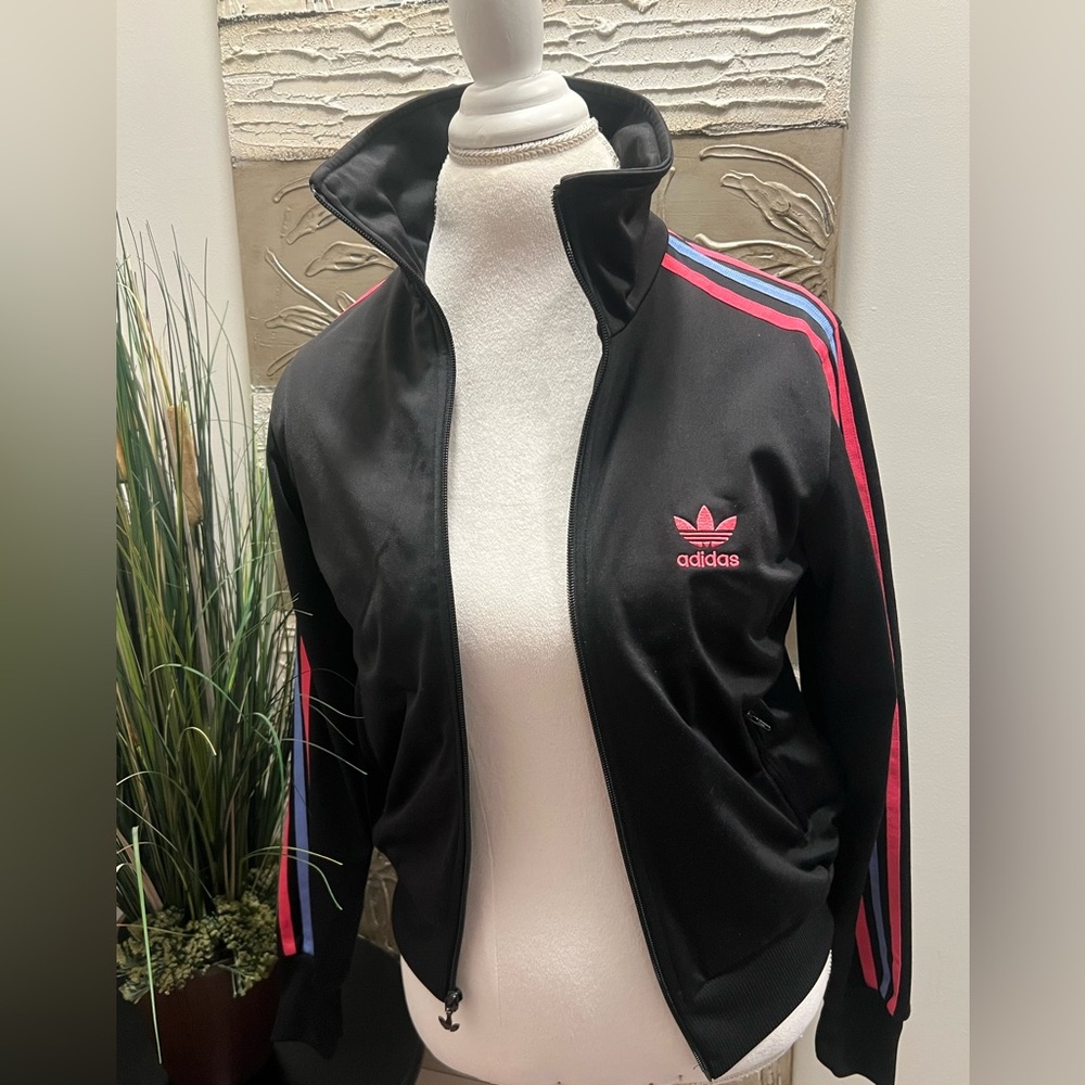 Adidas women's sweat~jacket size medium w/zipper pockets. Gently worn.